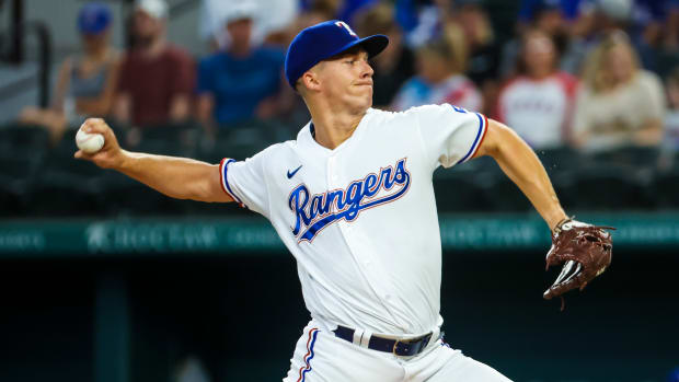 Jun 4, 2022; Arlington, Texas, USA; Texas Rangers starting pitcher Glenn Otto (49) throws during the first inning against the Seattle Mariners at Globe Life Field. Mandatory Credit: Kevin Jairaj-USA TODAY Sports